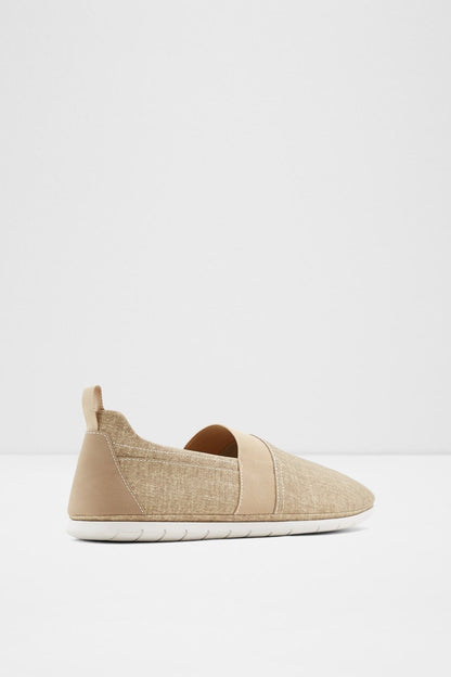 ALDO tan slip-on flat shoe with fabric upper, side panel, and textured white sole