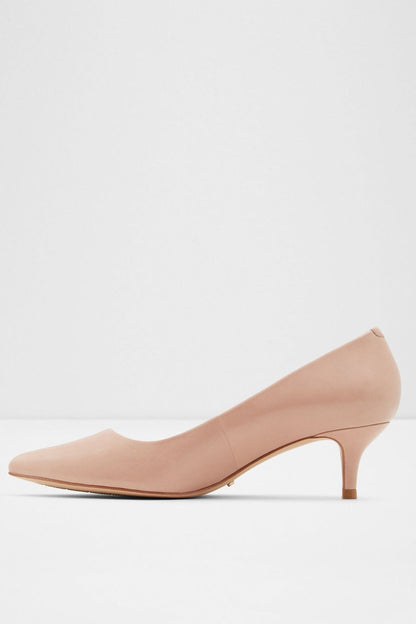 Beige pointed-toe low-heel pump, angled profile