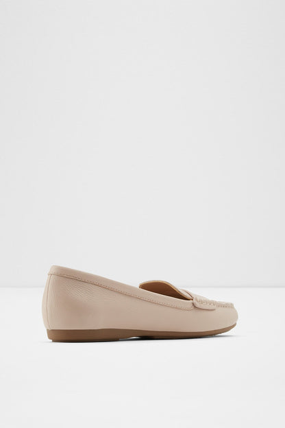 Light pink slip-on loafer with bow detail and moc-toe stitching