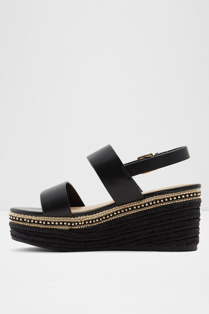 Black platform wedge sandals, single front strap and gold-trimmed espadrille edge