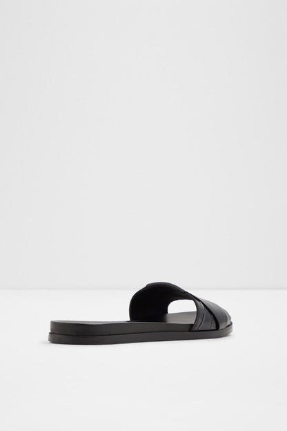 ALDO black slide sandal with open heel and wide croc-textured strap, flat sole