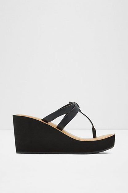 Black platform wedge sandals with cross straps and open toe