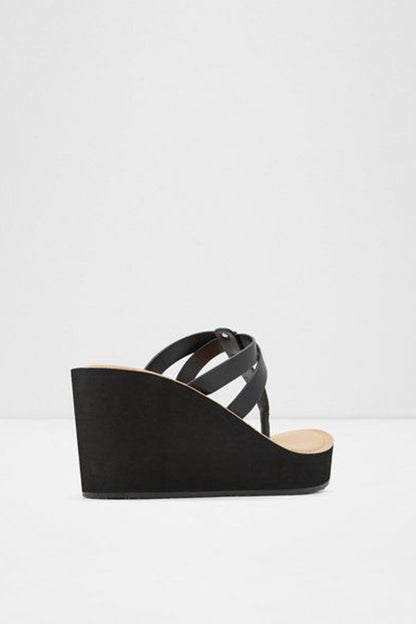 Black platform wedge sandal with open toe and crisscross straps