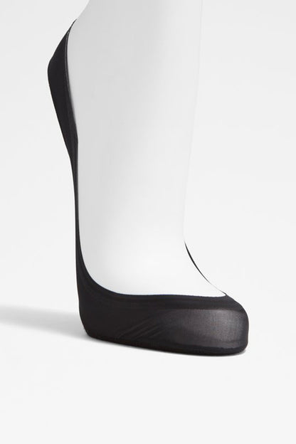Black sock-style slip-on shoe with low profile sole and smooth upper