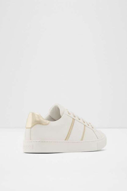 ALDO low-top sneakers, off-white upper with gold stripe detail, lace-up front