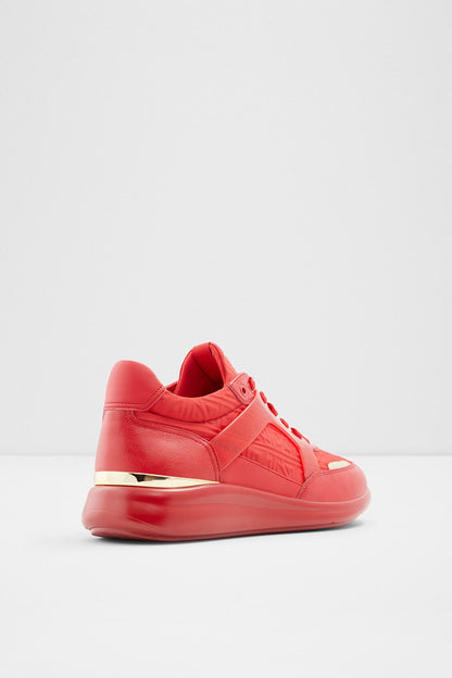 ALDO red low-top sneakers, side and heel view, gold sole detail