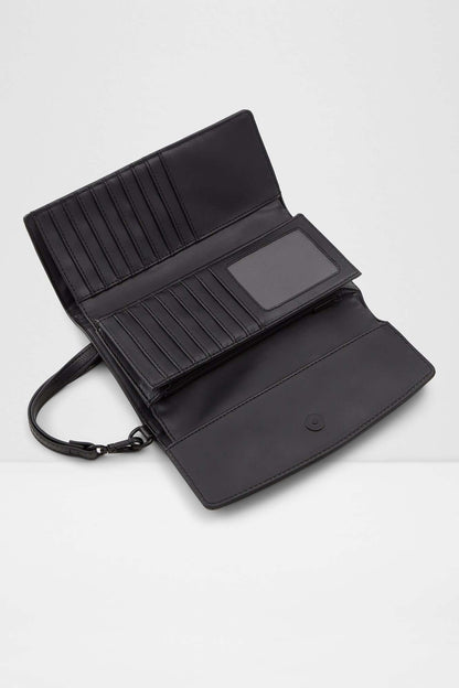 Black flap crossbody bag open view with card slots and snap pocket