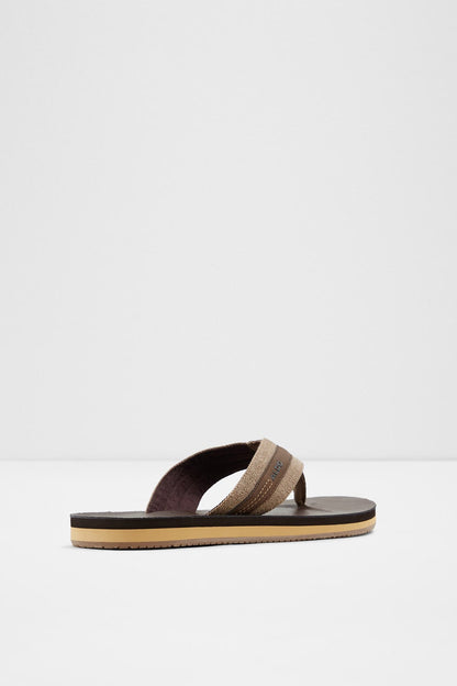 Brown ALDO flip-flop sandal, side view with dark footbed and woven-style strap
