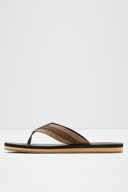 Brown ALDO flip-flop sandal, angled view with single thong strap and flat sole