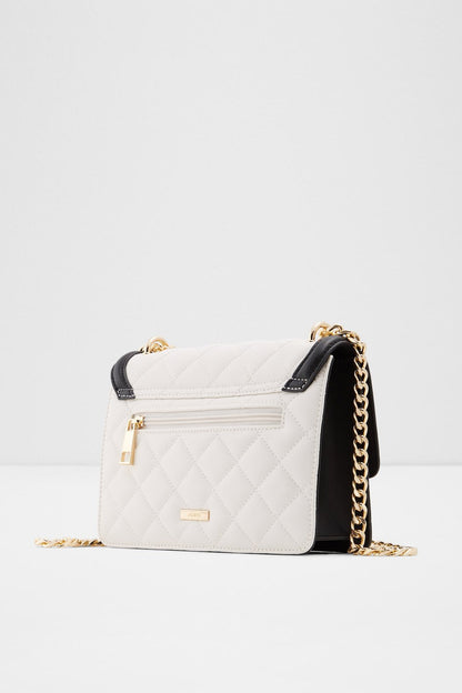 Quilted shoulder bag, white with black top, gold chain strap and front pocket