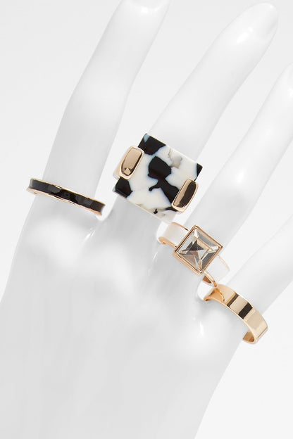 Cow-print panel bracelet with gold-tone links and square clear charm