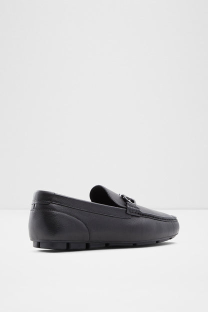 ALDO black leather loafer side view with metal buckle strap