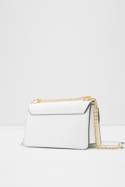 White crossbody handbag with gold chain shoulder strap, flap and clasp