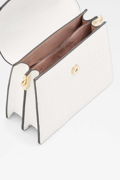 ALDO white leather-look handbag open, showing brown interior and gold turnlock
