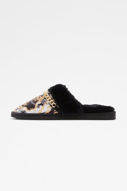 Black faux-fur slide mule with white-and-gold patterned upper and open toe