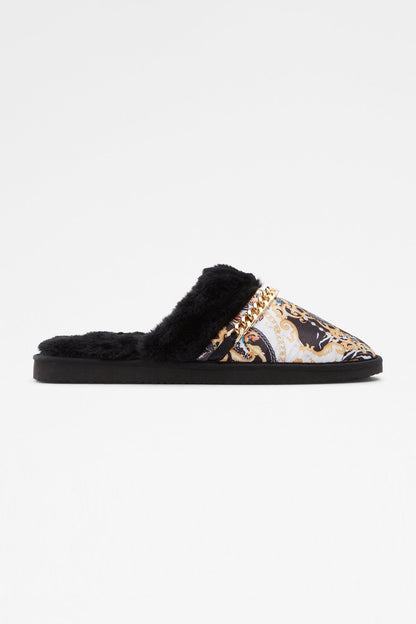 Black faux-fur slide mule with patterned satin upper and gold chain trim