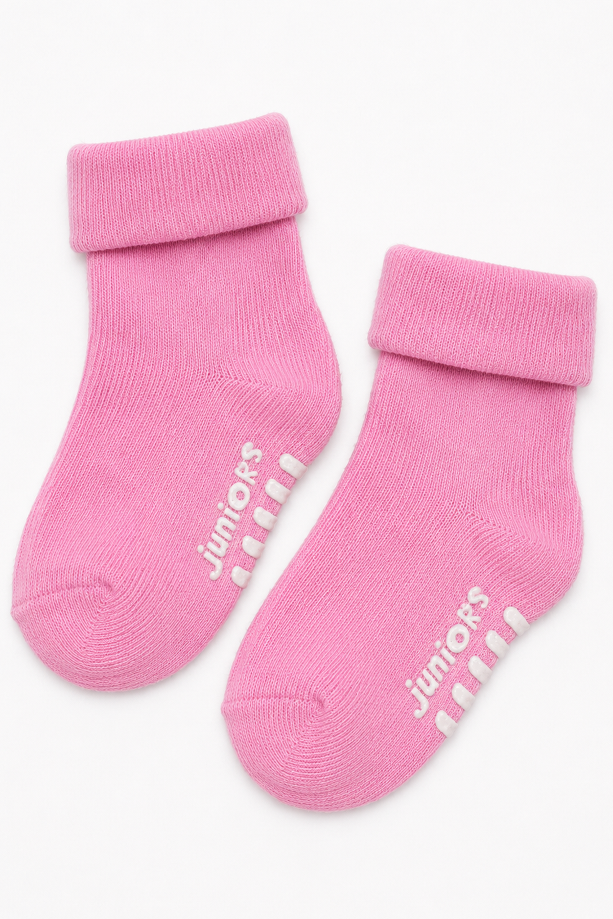 Pink knit baby socks with "juniors" text and ribbed cuffs
