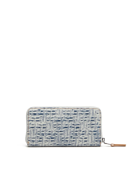 Diesel light blue patterned zip wallet with tan wrist strap and flat front