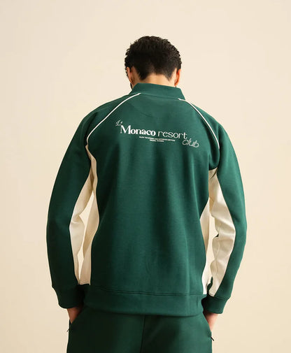 Green back view zip tracksuit jacket with printed logo and white shoulder panels