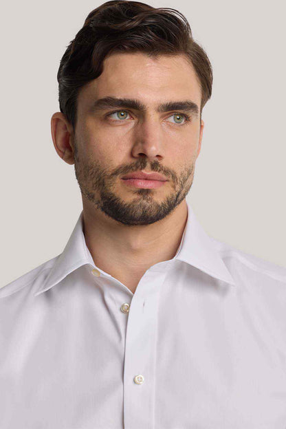 White dress shirt collar with button placket and small gold-tone buttons