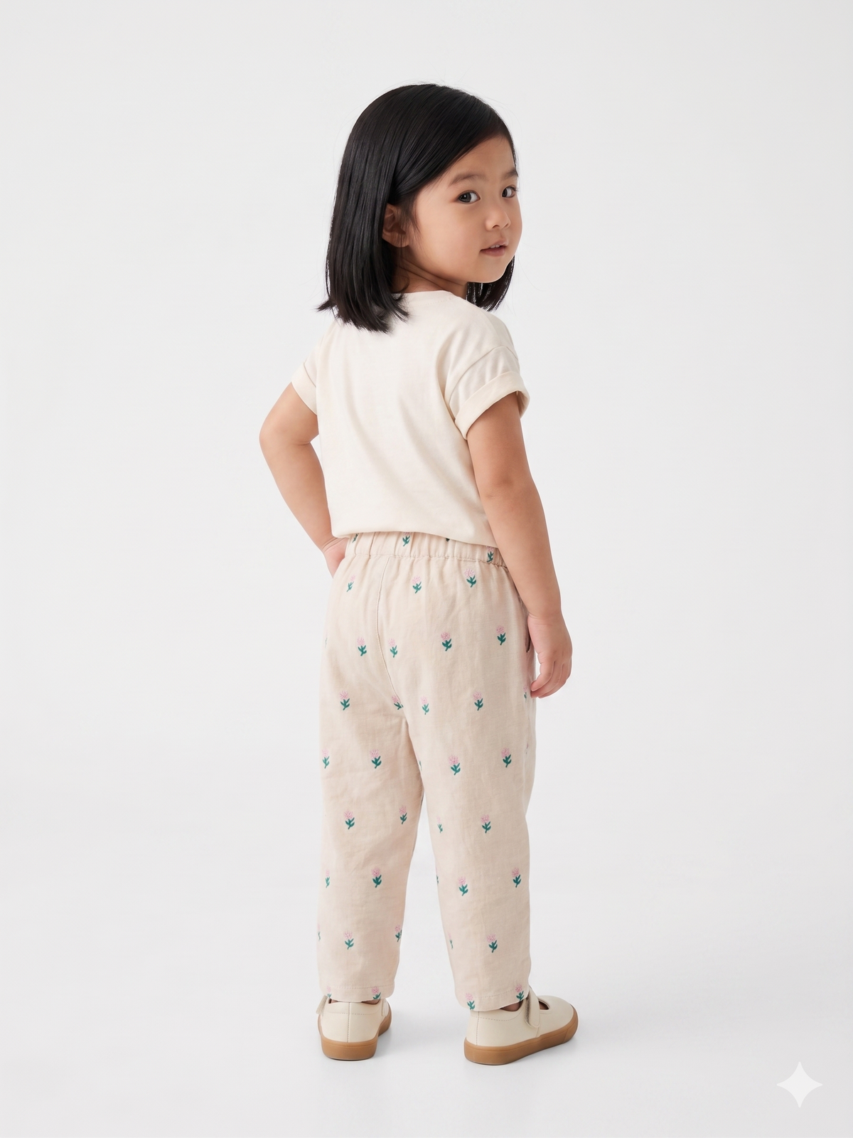 Cream kids' pants with teal and pink cactus print, elastic waistband, cuffed ankles
