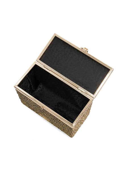 Gold studded mini handbag open with fabric-lined interior and clasped frame