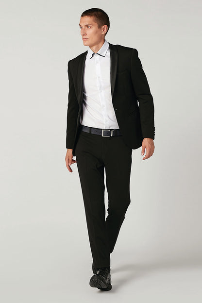 Men's white dress shirt under black blazer, button front and point collar