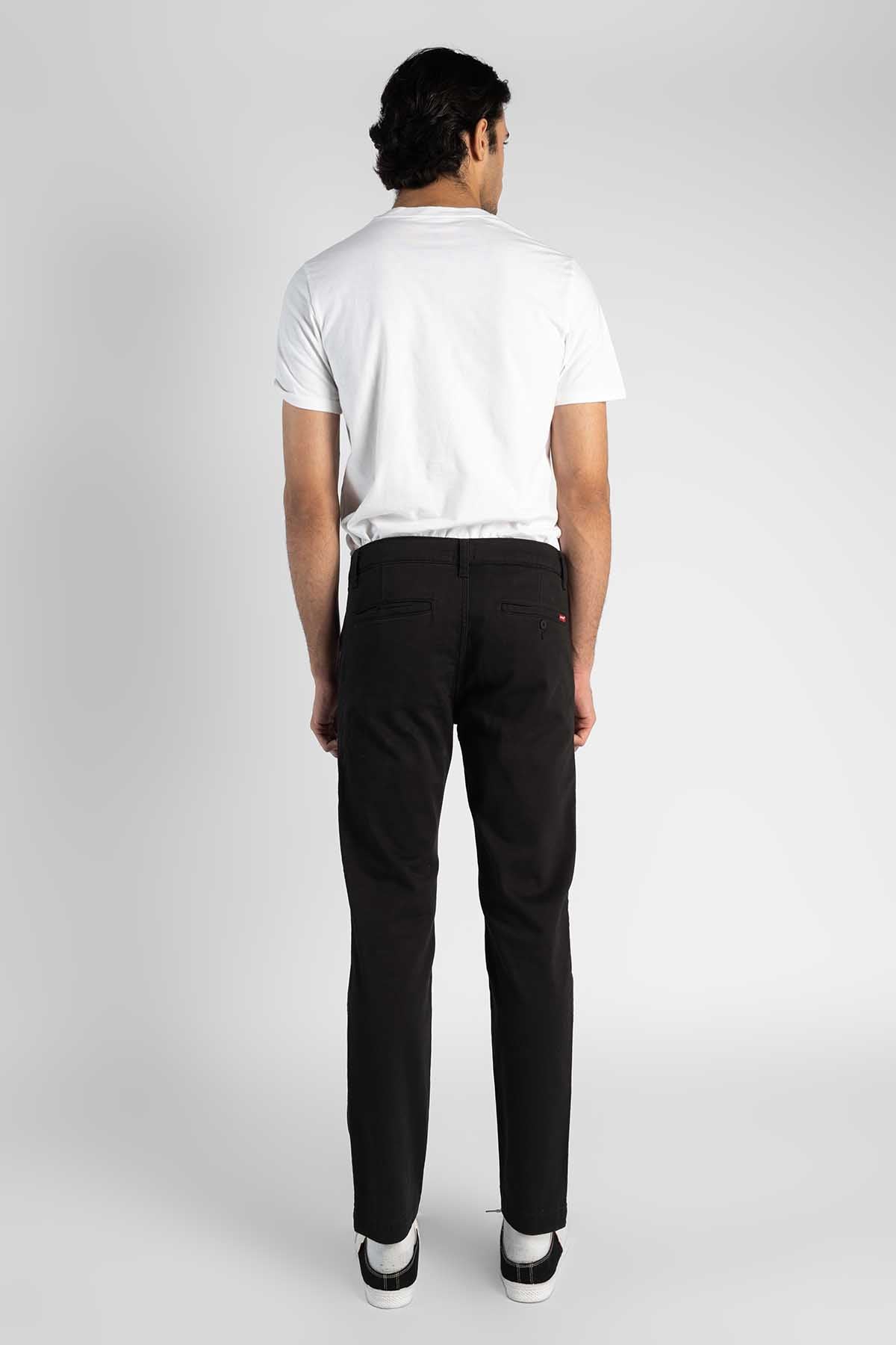 Men's black jeans, five-pocket back view