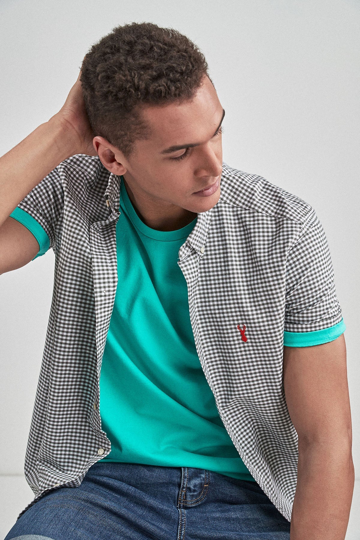 Men's teal crew-neck T-shirt with green sleeve trim