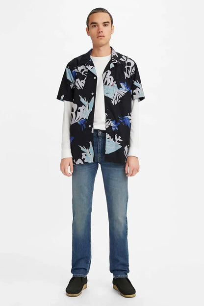 Blue straight-leg jeans, front view, dark wash denim with stitched seams