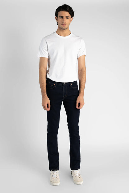 Levi's dark indigo denim jeans with straight legs and five-pocket design