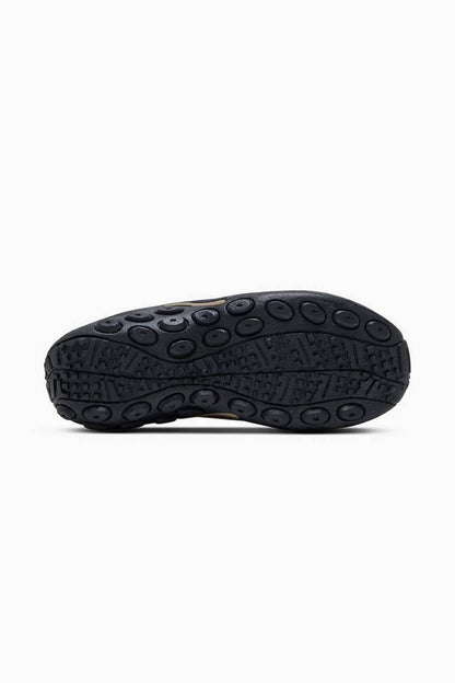 Black rubber outsole with multi-directional tread for slip-on shoes
