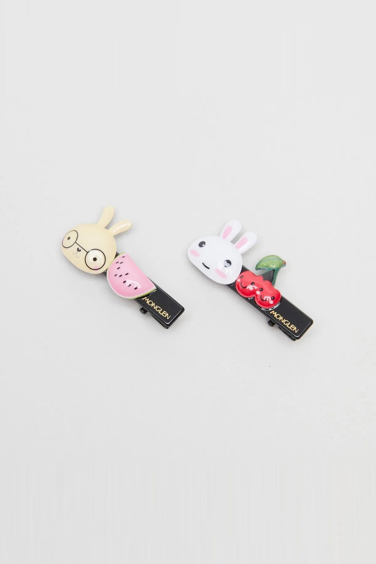 Cute animal-themed hair clips set, with snail and bunny faces on black clips