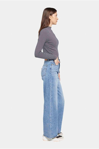 Levi's light-wash denim jeans with wide straight legs and classic five-pocket styling.