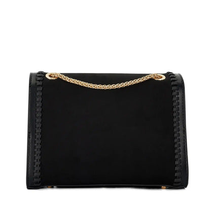 Black flap shoulder bag with gold chain strap and textured side panel stitching.