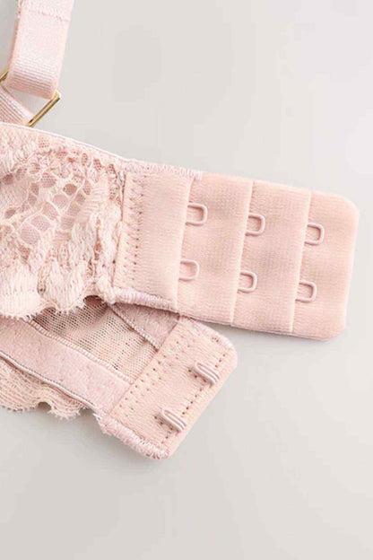 Light pink lace bra band with three-row adjustable hook-and-eye closure