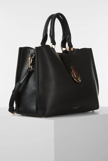 Black tote bag with side zip pocket, gold-tone hardware, and shoulder strap