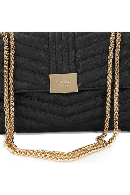 Black quilted bag flap with gold logo plate and gold chain strap links