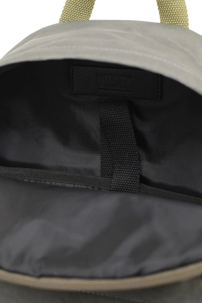 Diesel backpack front panel close-up with zipper and woven strap