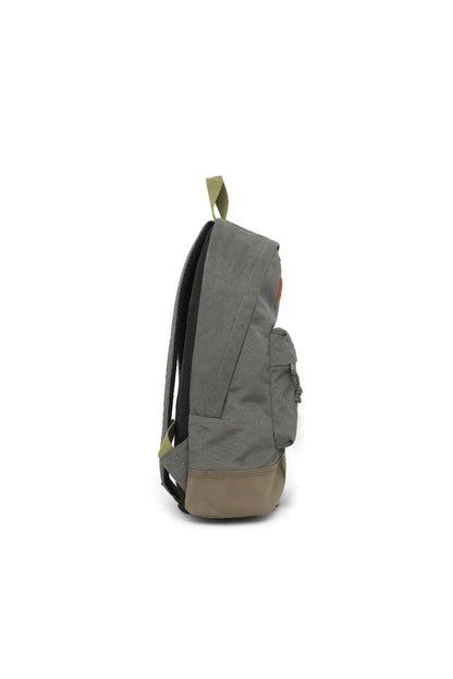 Grey Diesel backpack side profile with front zip pocket and olive base