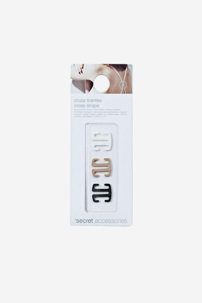 Cross-strap accessory card in white with brown and black branding