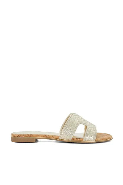 Gold metallic woven slide sandal with wide cross strap