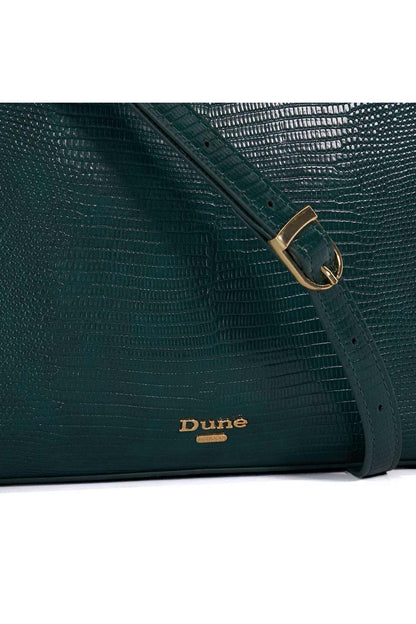 Dark green tote bag with gold logo badge and adjustable strap hardware detail