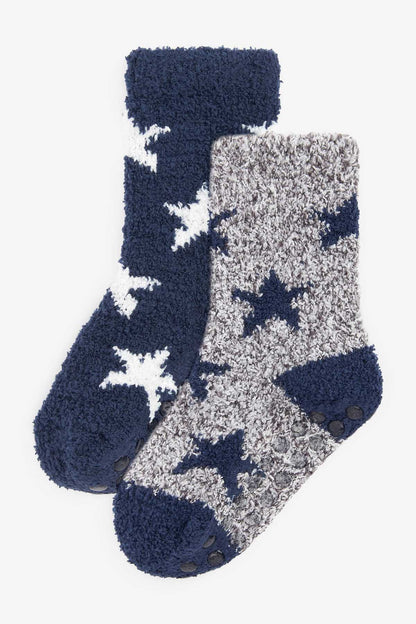 Fuzzy socks set: navy and gray panels, white stars, rubber grip dots
