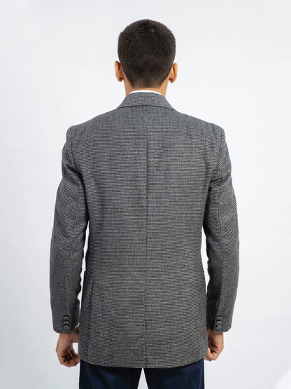 Grey textured blazer back view with notch lapel and single-breasted front