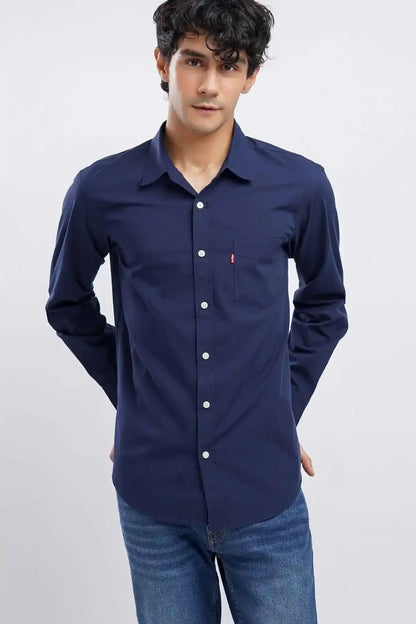 Men's navy button-up shirt with long sleeves, front buttons, chest logo