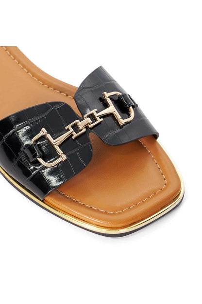 Dune London black slide sandals, glossy strap with gold buckle detail and stitched sole