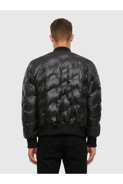 Black quilted puffer jacket back view with ribbed hem and cuffs