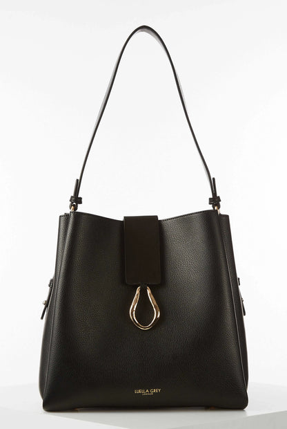Black leather tote bag with top handles and front clasp