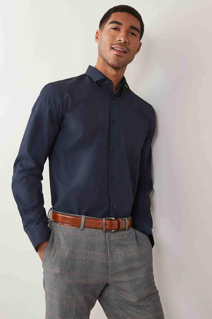 Men's navy button-up dress shirt with chest buttons and pointed collar.